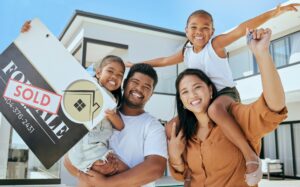 Purchase Mortgage - Real estate, house and portrait of family with sale poster and happy with home, mortgage and proper